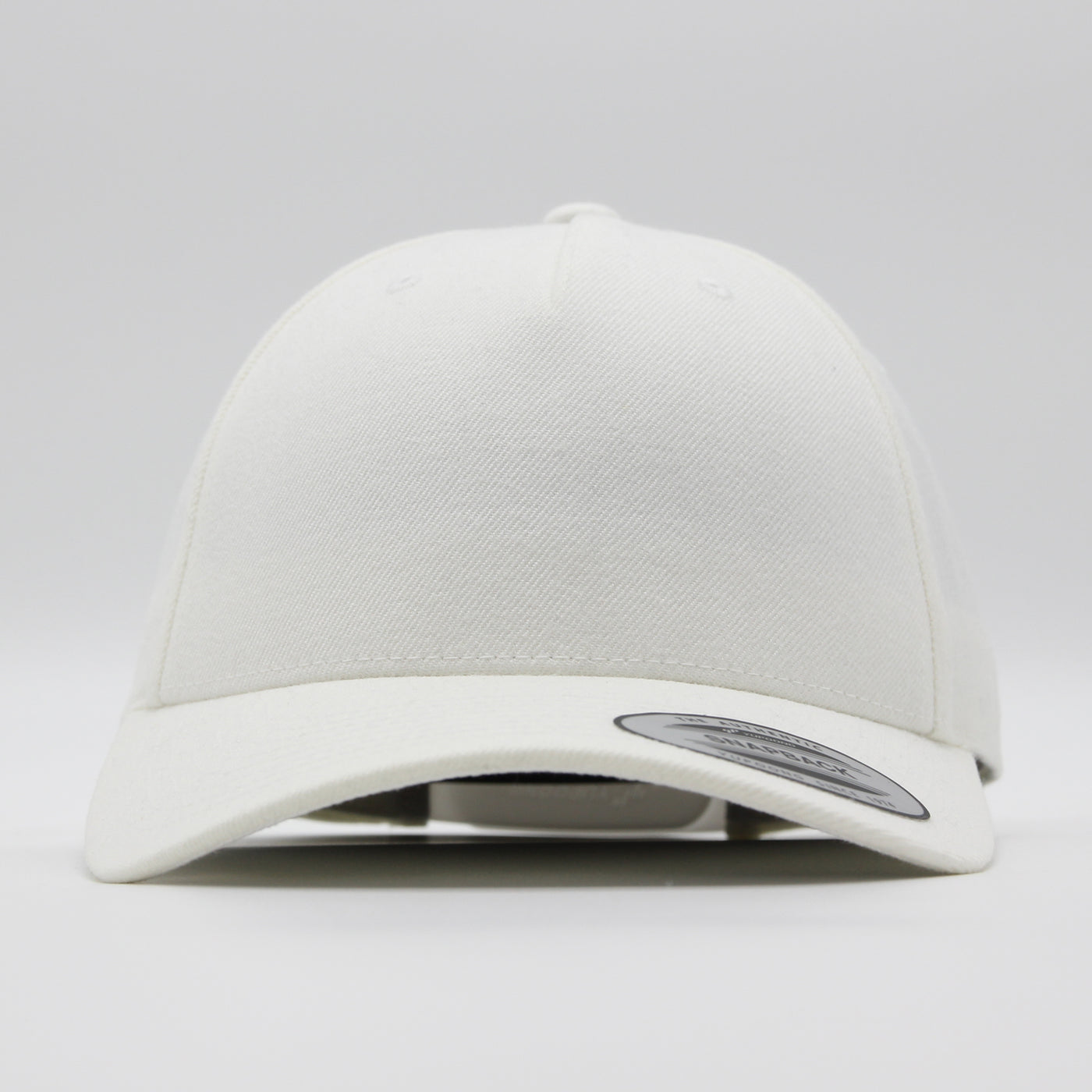 The Classics Yupoong 5-panel Premium Curve snapback white