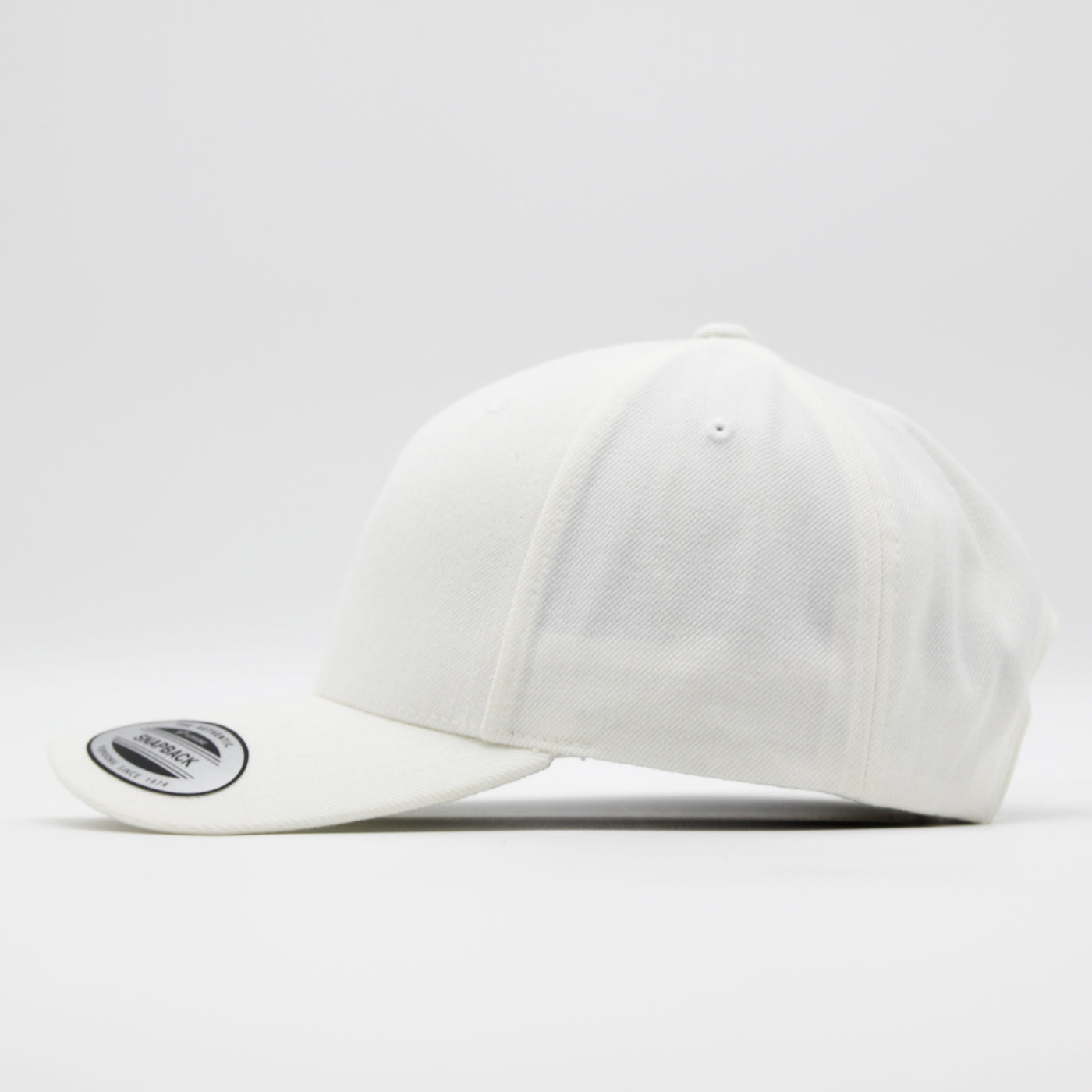 The Classics Yupoong 5-panel Premium Curve snapback white