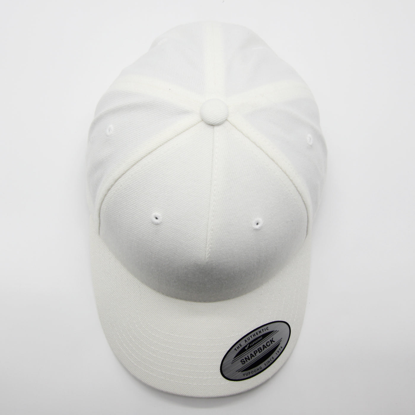 The Classics Yupoong 5-panel Premium Curve snapback white