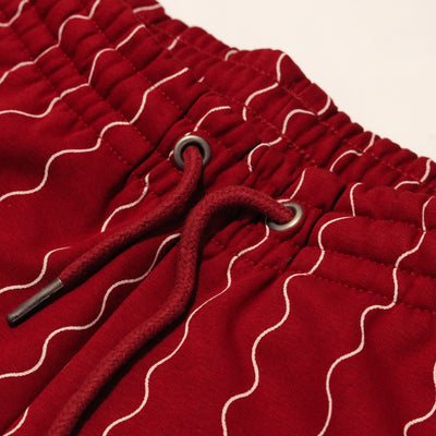 Karl Kani Small Signature Ziczac Pinstripe relaxed fit sweatpants dark red/off white - Shop-Tetuan