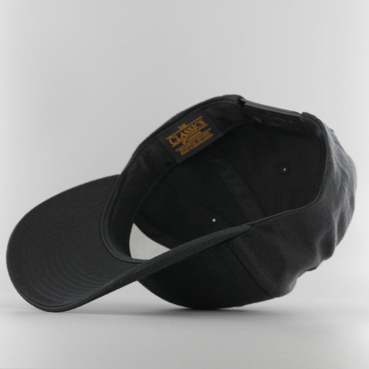 The Classics Yupoong Premium Curved Visor Snapback Cap black - Shop-Tetuan