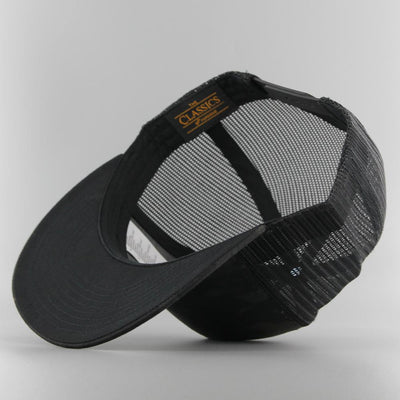 The Classics Yupoong Multicam Trucker Cap black