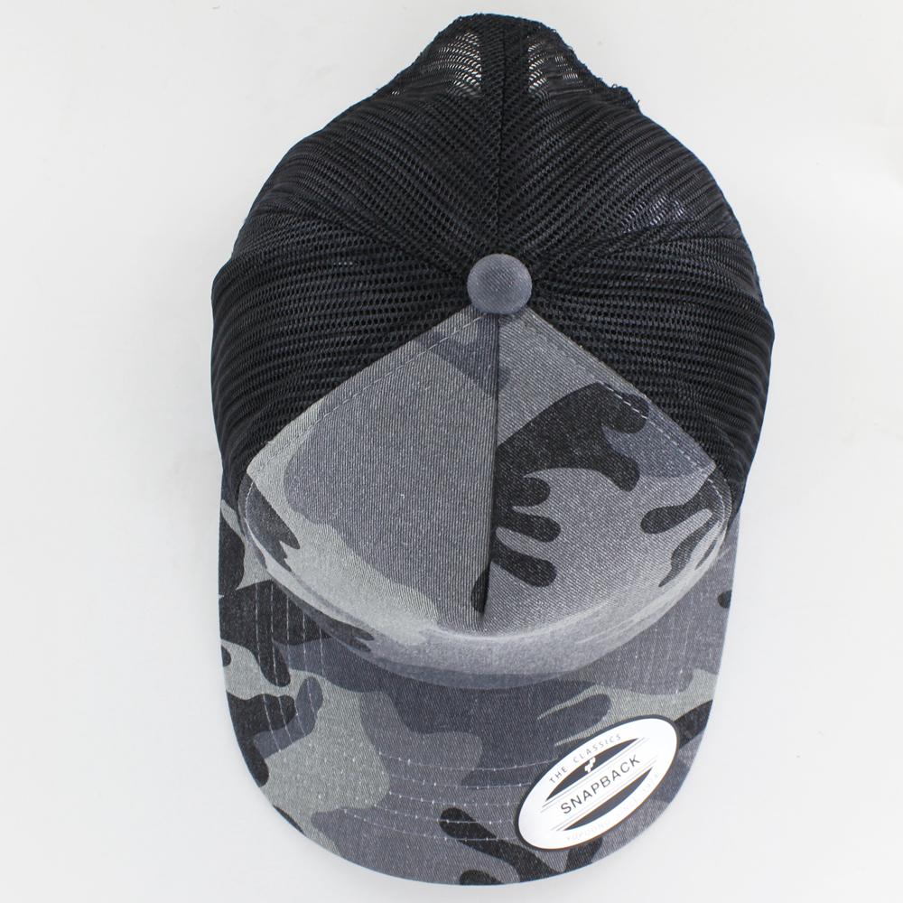 The Classics Yupoong Camo Trucker cap dark camo/blk - Shop-Tetuan