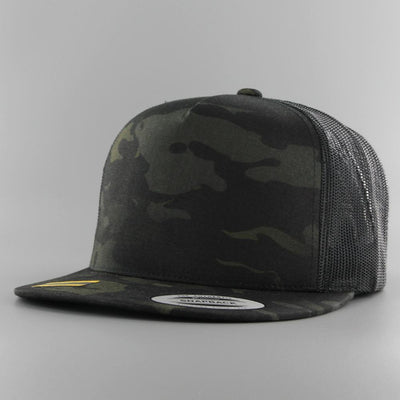 The Classics Yupoong Multicam Trucker Cap black